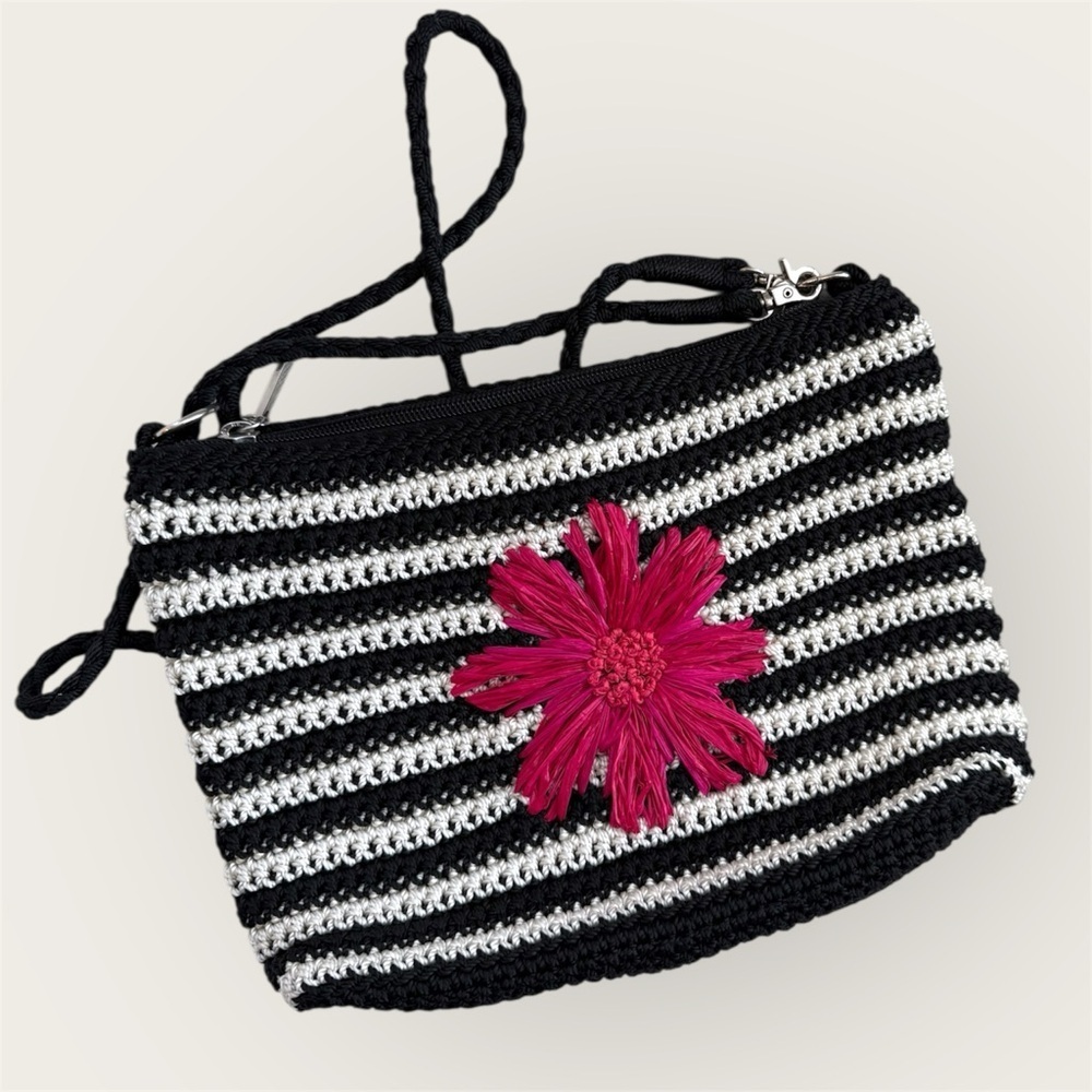 The Sak crochet 90s style Black and White Striped Bag with Pink Flower Accent